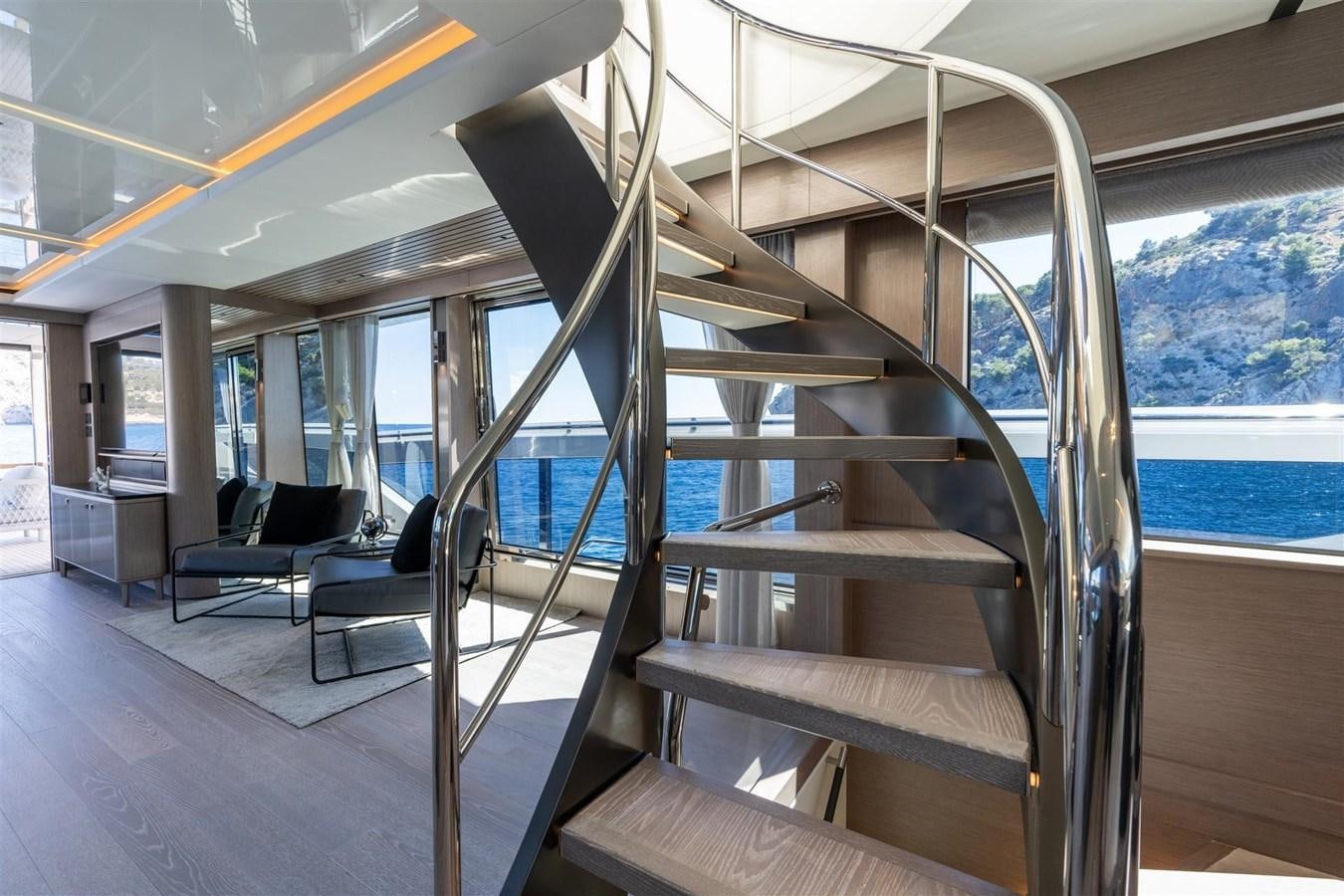 a room with a large glass window aboard WORTH THE WAIT Yacht for Sale