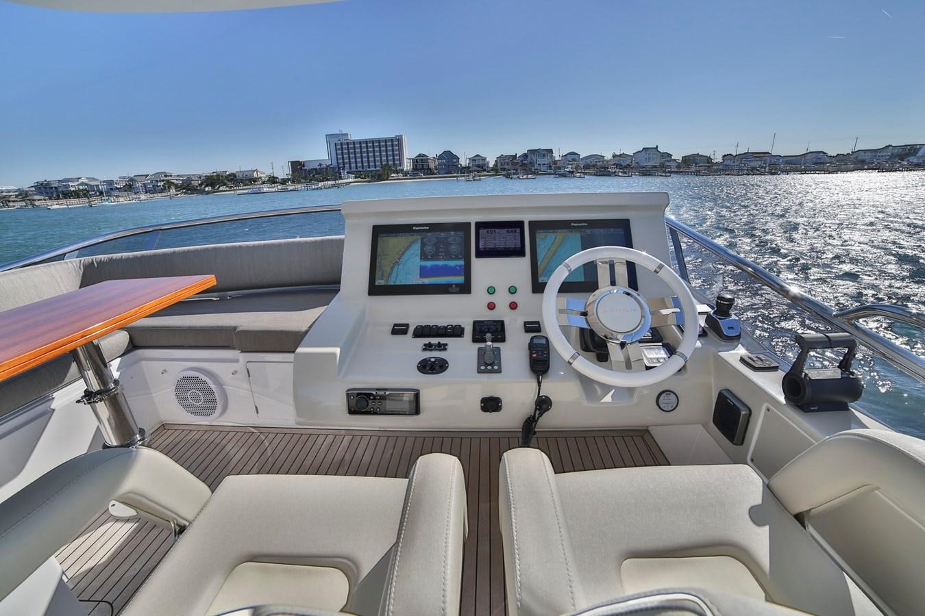 a boat with a steering wheel aboard SIRONA JOANNAH Yacht for Sale
