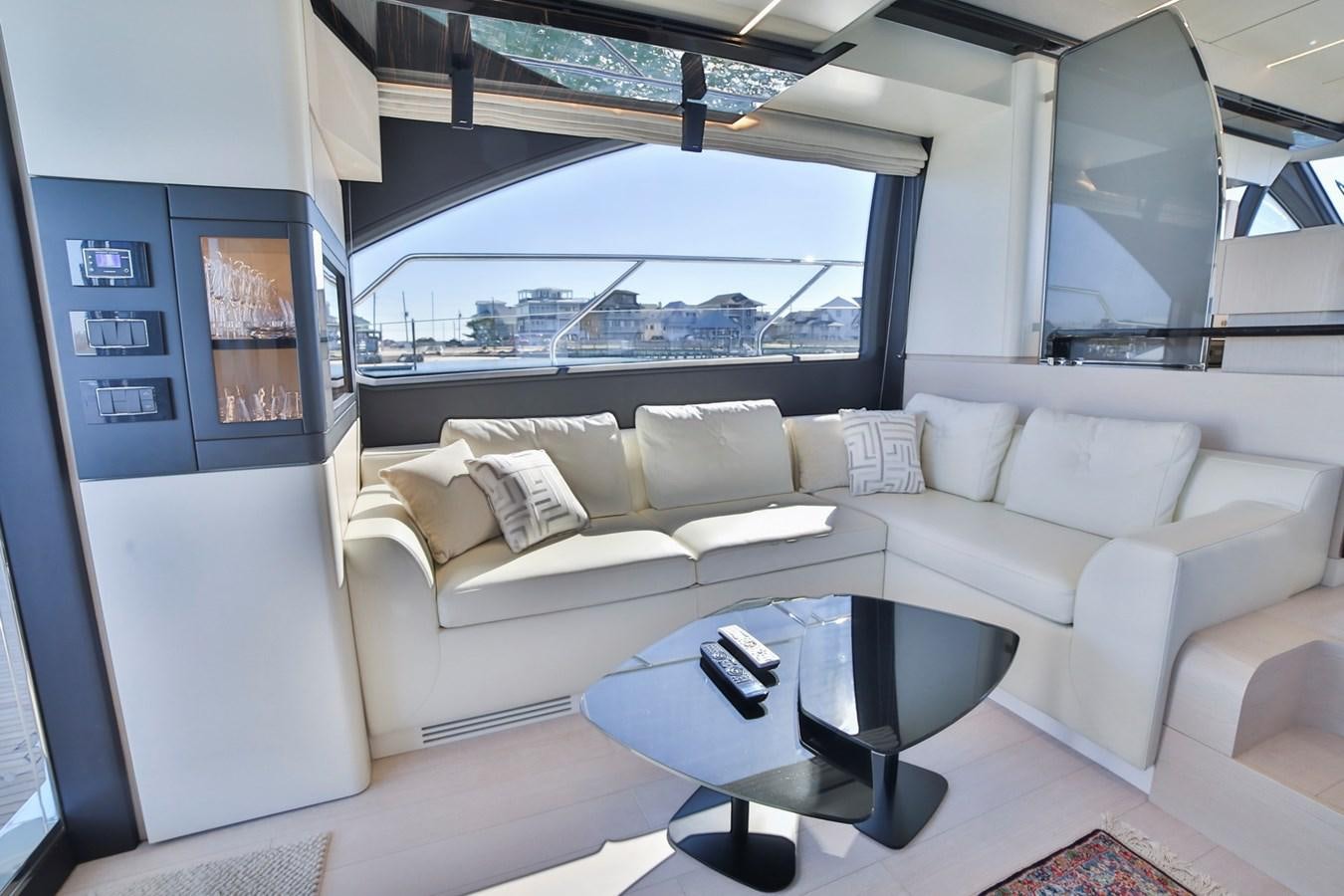 a white couch in a room aboard SIRONA JOANNAH Yacht for Sale