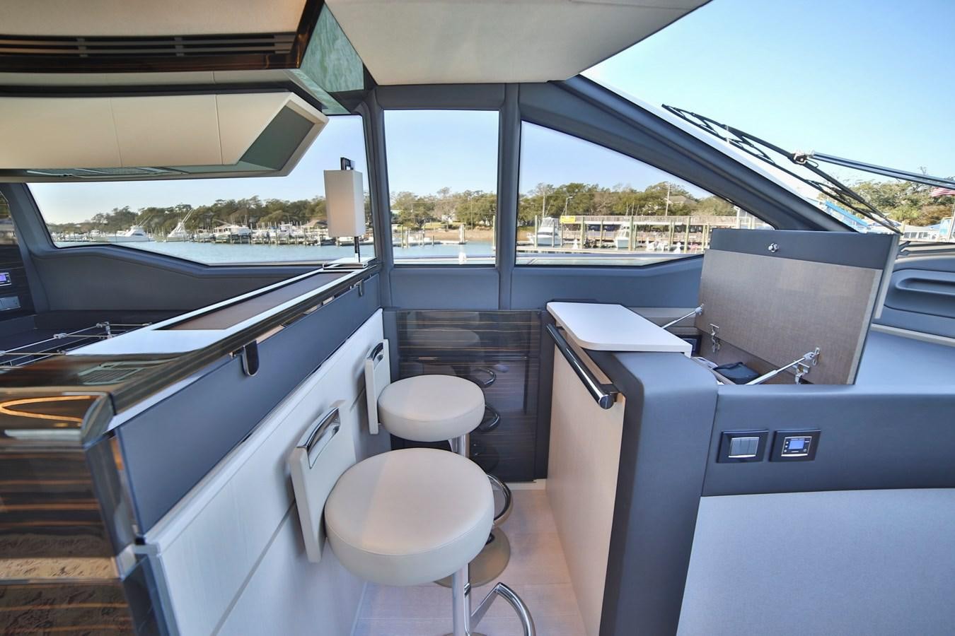 a boat with a seat and a sink on the side aboard SIRONA JOANNAH Yacht for Sale