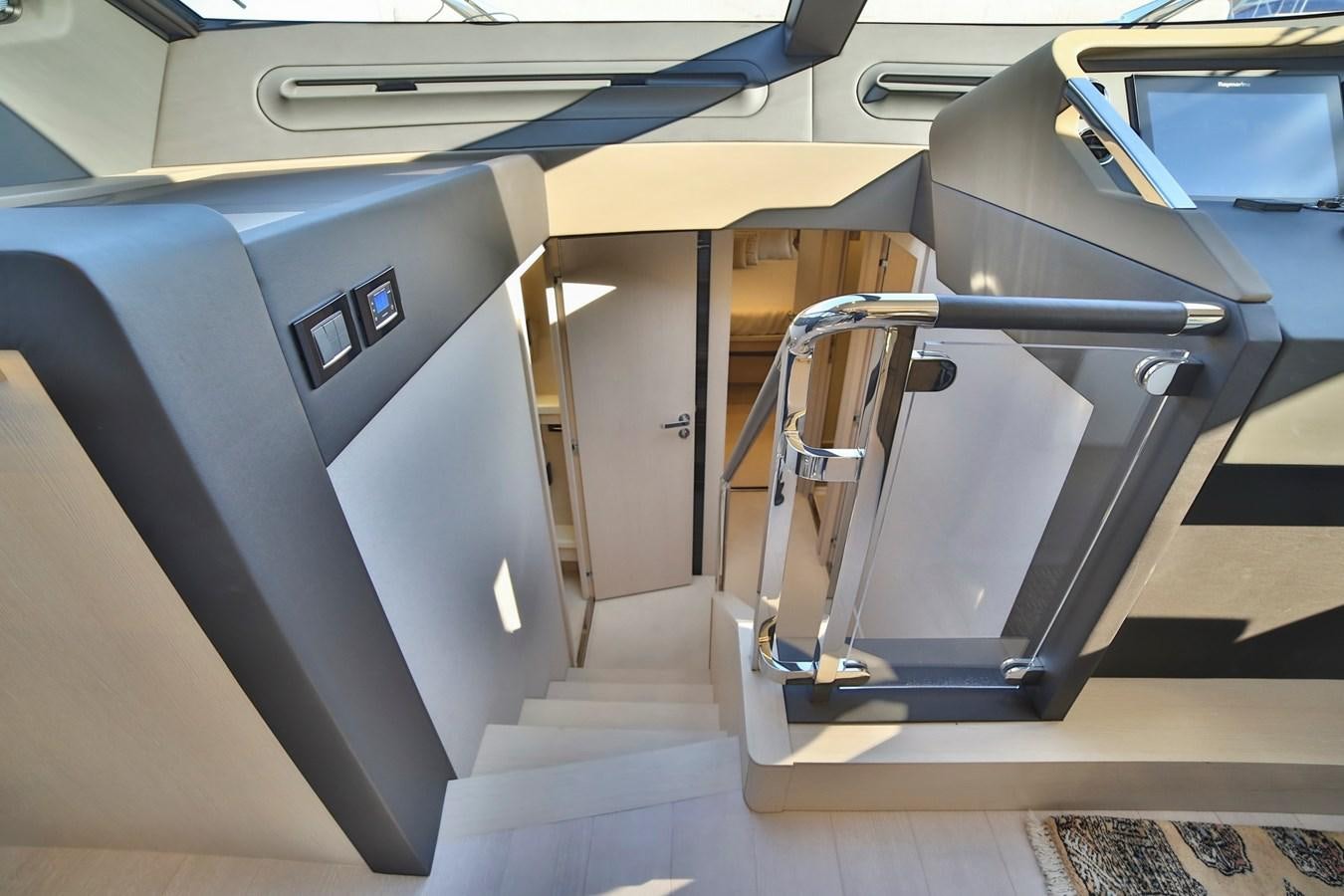 a car with doors open aboard SIRONA JOANNAH Yacht for Sale