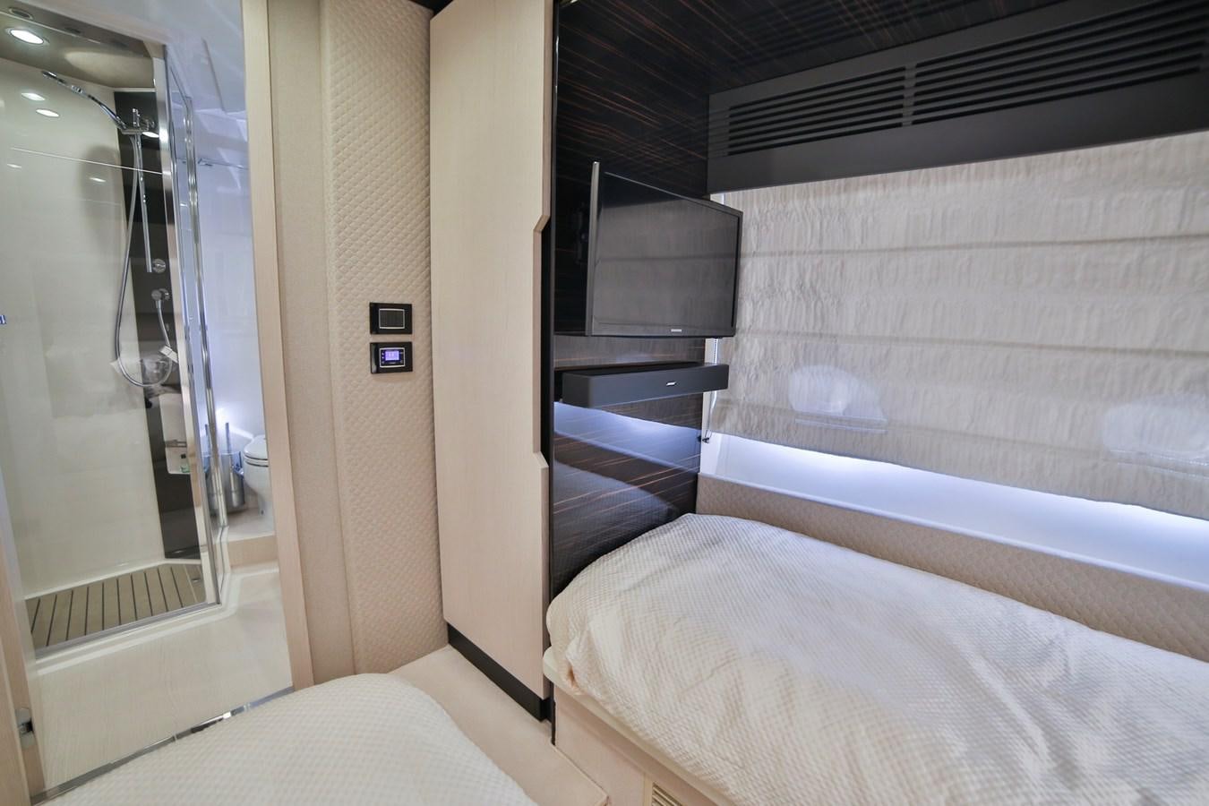 a room with a bed and a door aboard SIRONA JOANNAH Yacht for Sale