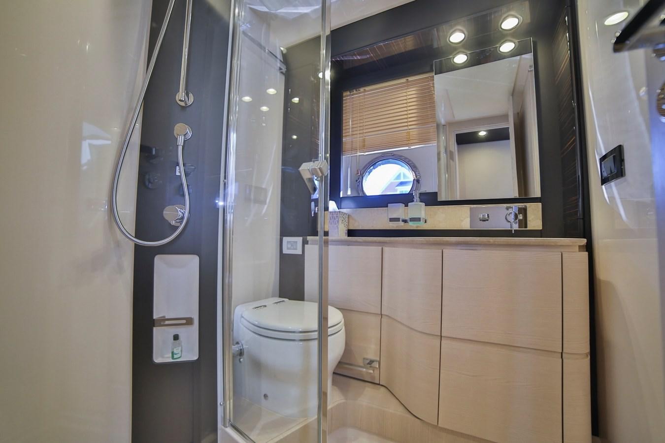 a bathroom with a glass shower aboard SIRONA JOANNAH Yacht for Sale