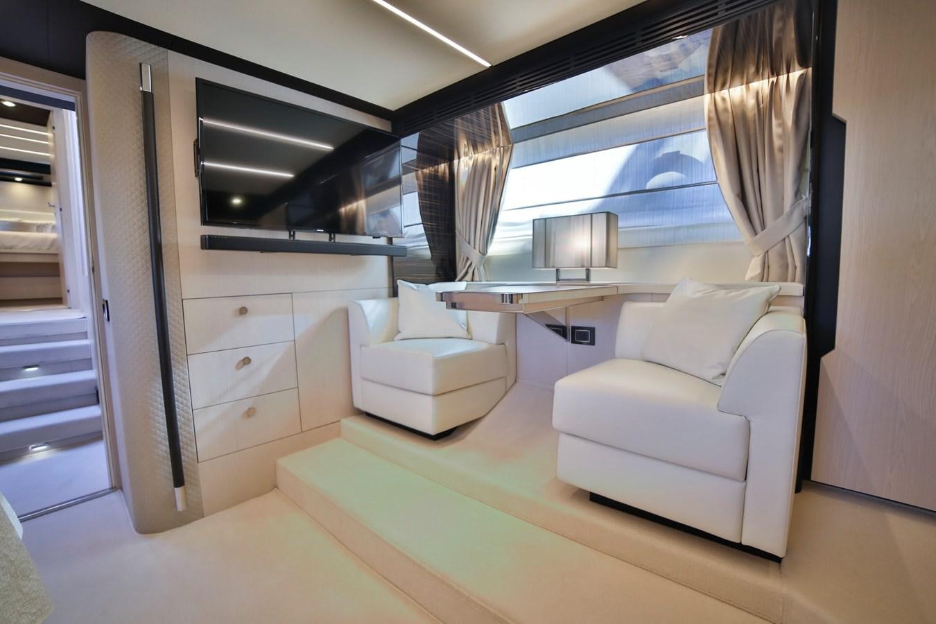 a room with a desk and a bed aboard SIRONA JOANNAH Yacht for Sale