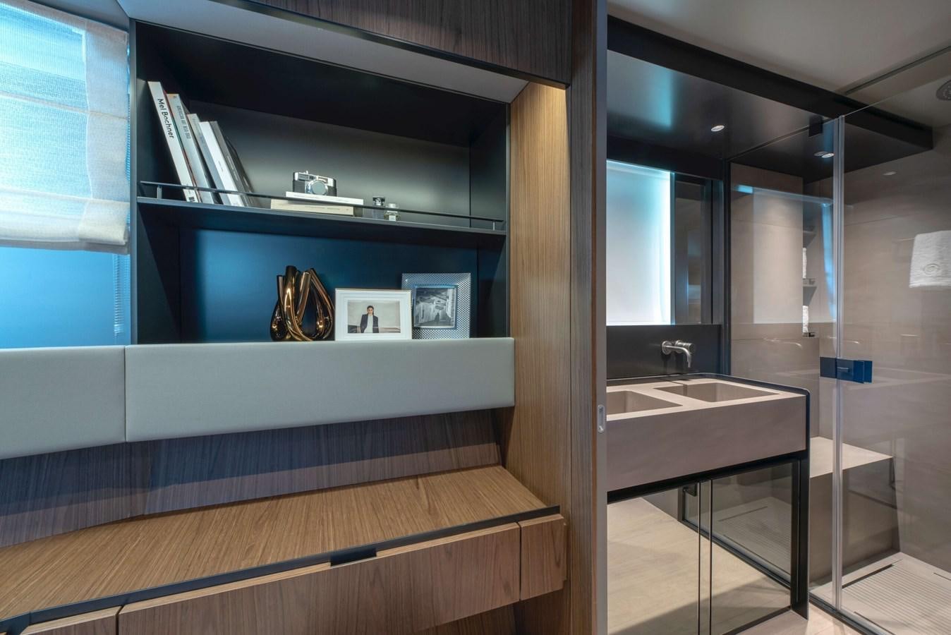 a bathroom with a sink and a mirror aboard ELLEMAR Yacht for Sale