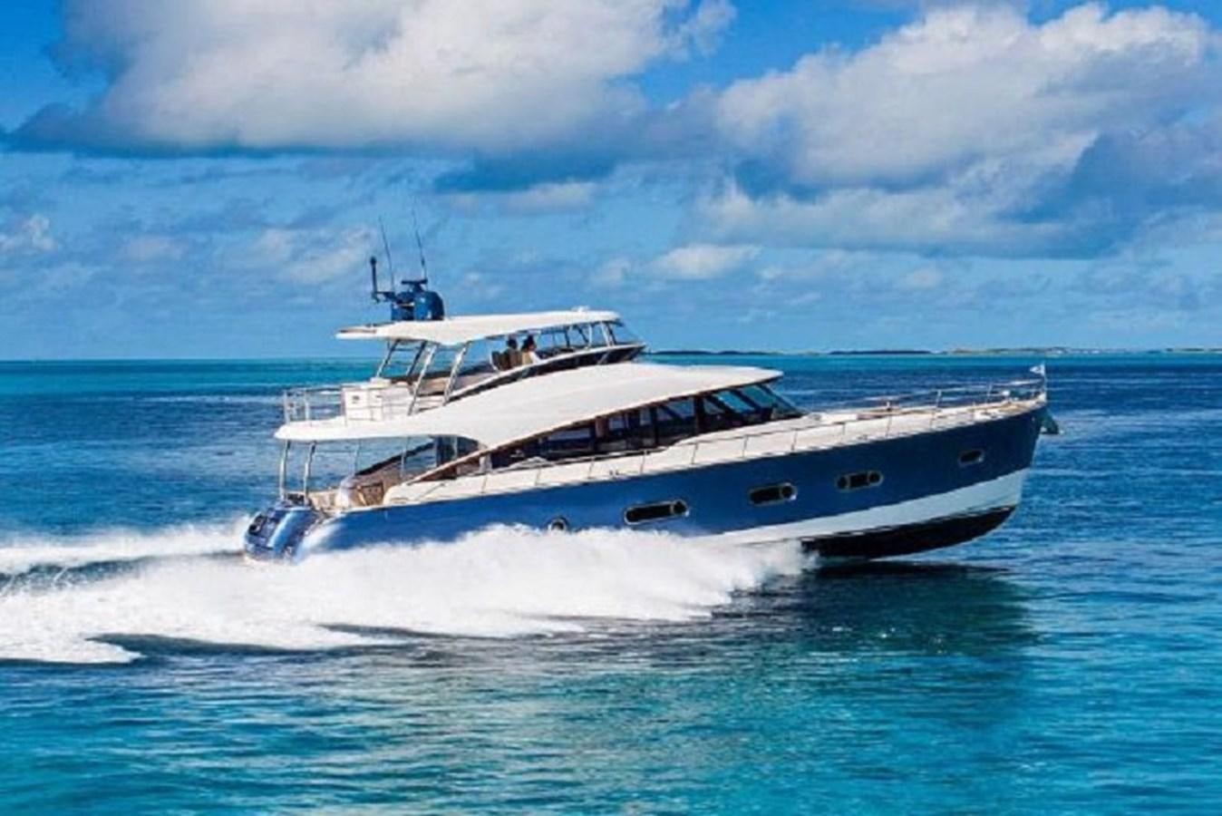 a large ship on the water aboard 2023 RIVIERA 66 BELIZE DAYBRIDGE Yacht for Sale