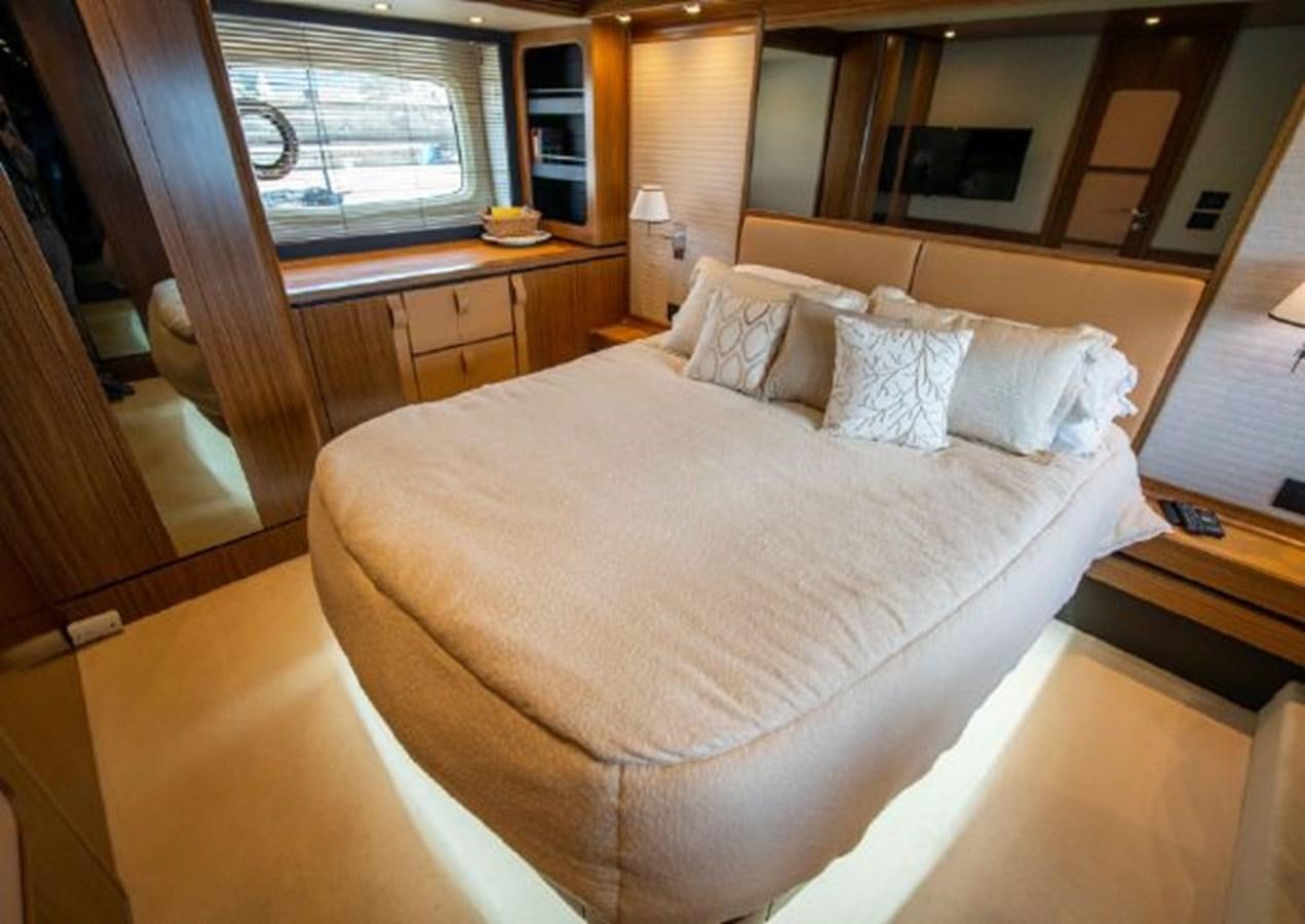 a bed in a room aboard 2016 AZIMUT MAGELLANO 66 Yacht for Sale