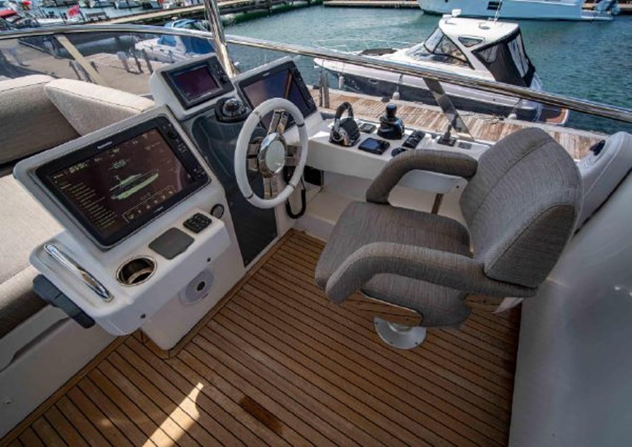 a boat with a computer on it aboard 2016 AZIMUT MAGELLANO 66 Yacht for Sale