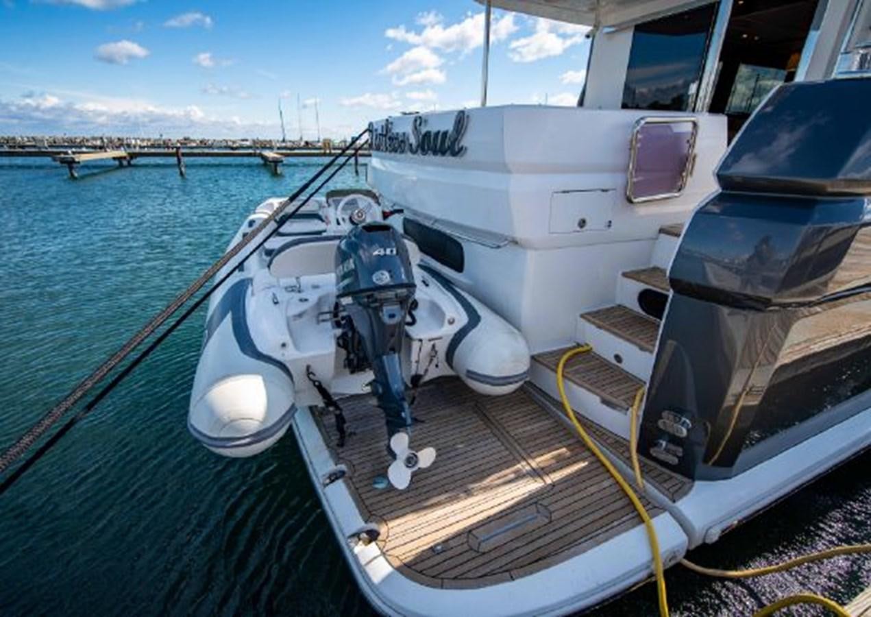 a boat with a person on it aboard 2016 AZIMUT MAGELLANO 66 Yacht for Sale