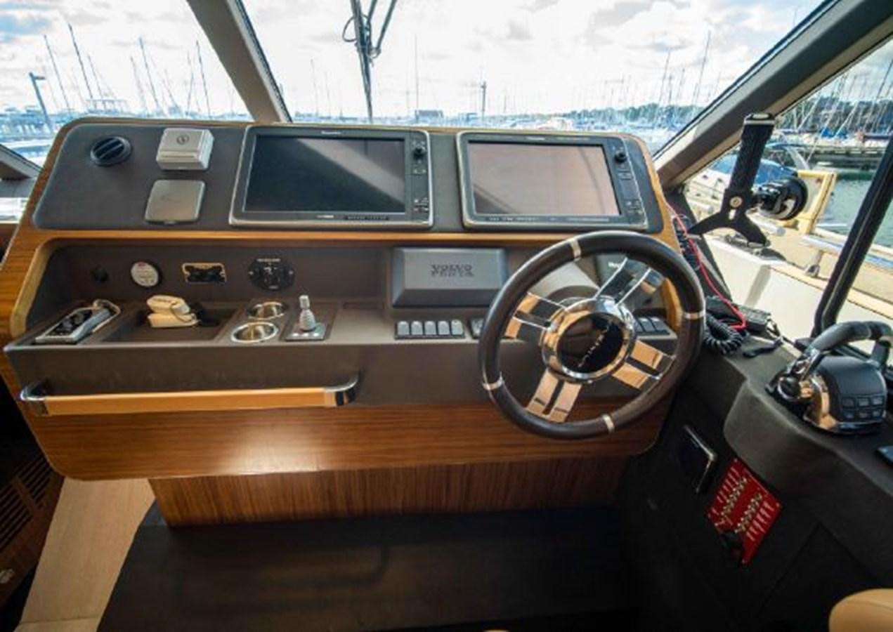 the inside of a car aboard 2016 AZIMUT MAGELLANO 66 Yacht for Sale
