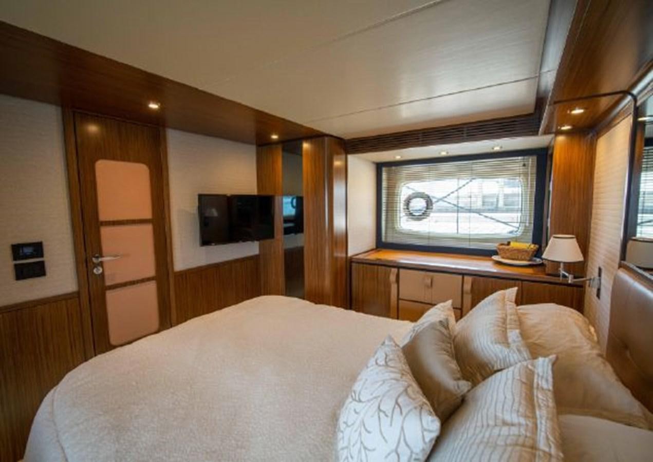 a bed in a room aboard 2016 AZIMUT MAGELLANO 66 Yacht for Sale