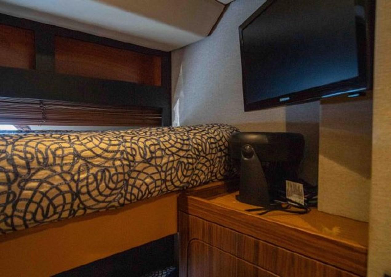 a tv on a wall aboard 2016 AZIMUT MAGELLANO 66 Yacht for Sale