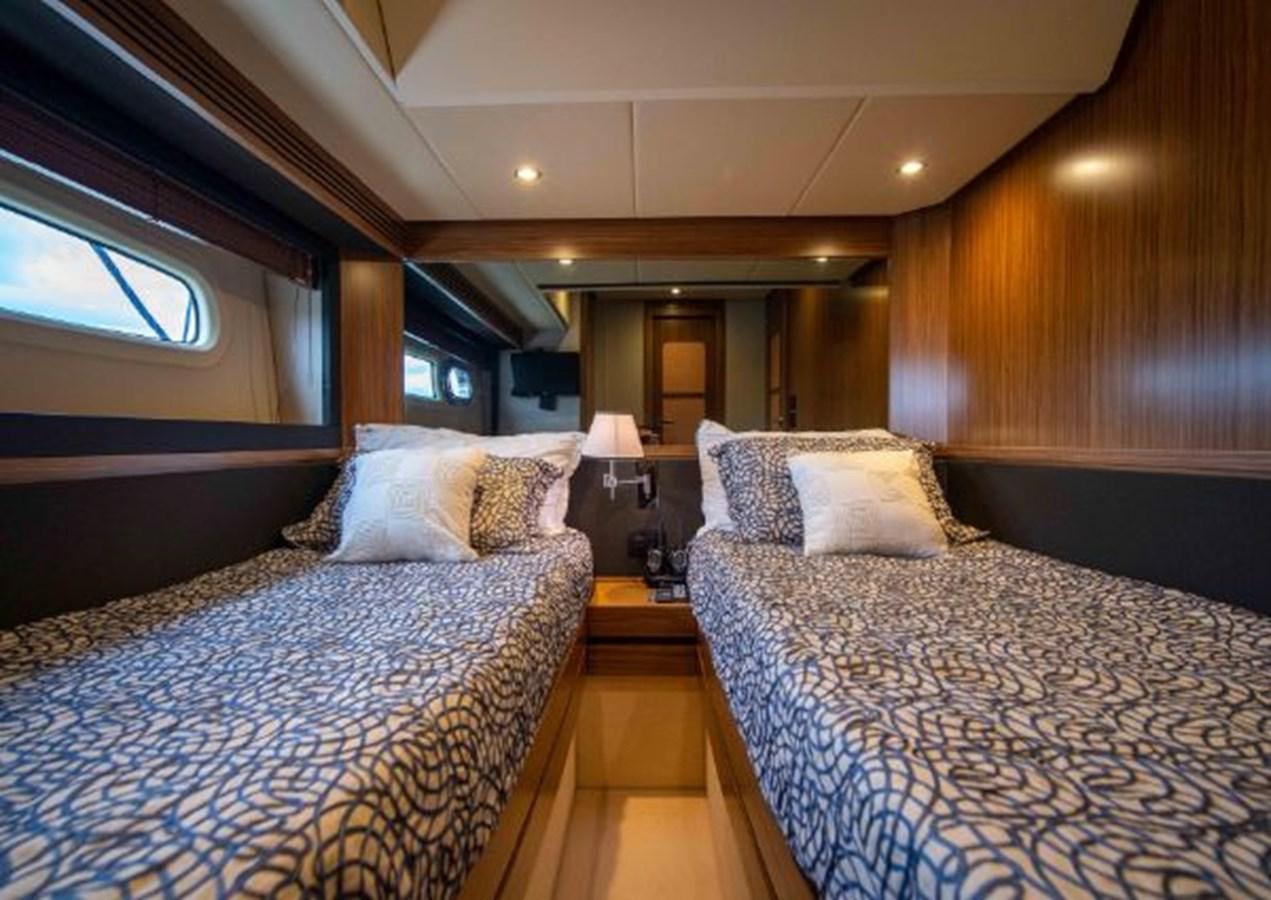 a couple of beds in a hotel room aboard 2016 AZIMUT MAGELLANO 66 Yacht for Sale