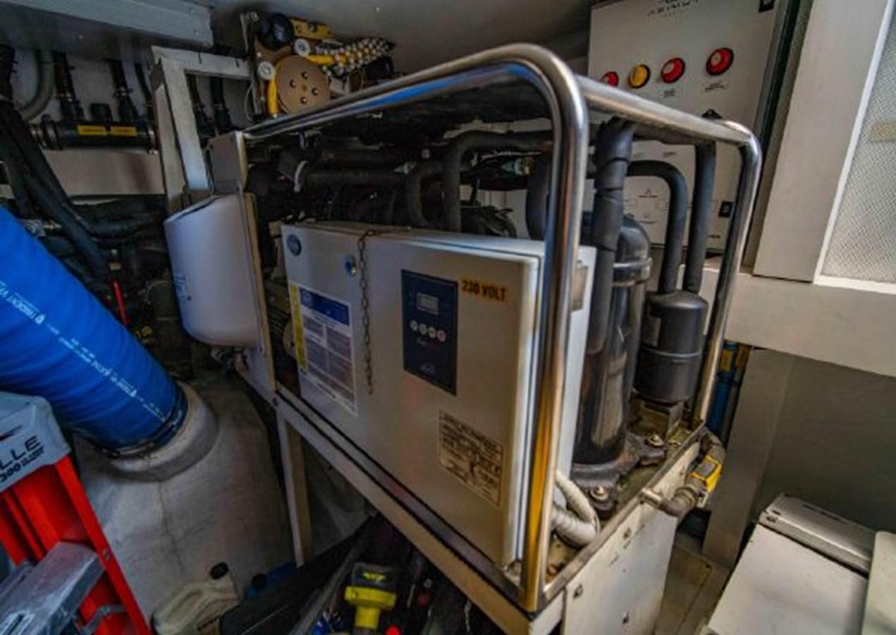 a machine with a piece of paper in it aboard 2016 AZIMUT MAGELLANO 66 Yacht for Sale