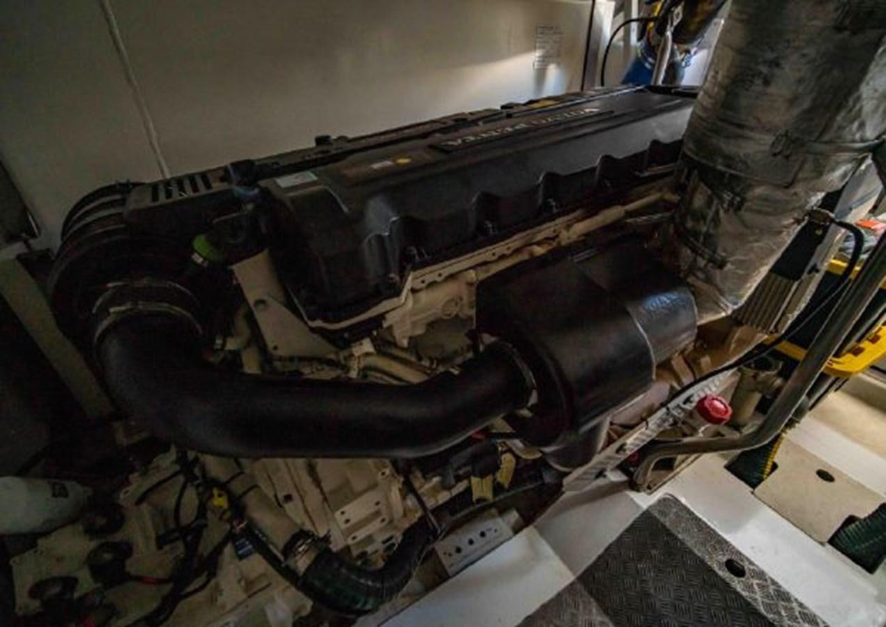 a car engine with a black hood aboard 2016 AZIMUT MAGELLANO 66 Yacht for Sale