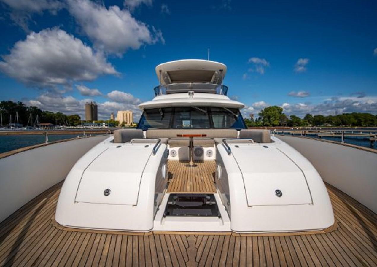 a boat on a dock aboard 2016 AZIMUT MAGELLANO 66 Yacht for Sale