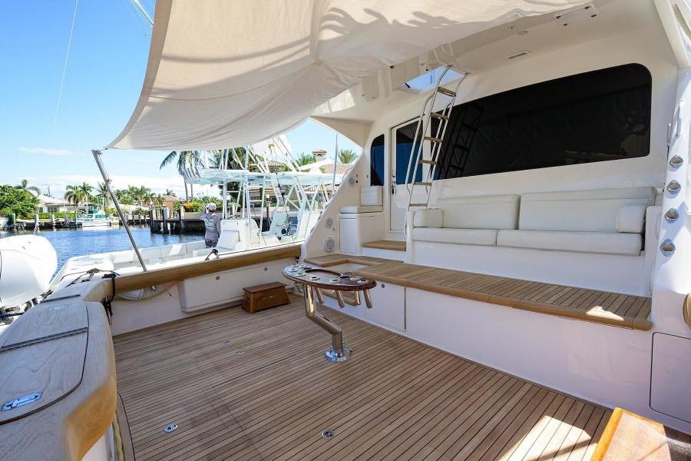 a boat on the water aboard ENCLOSED BRIDGE Yacht for Sale