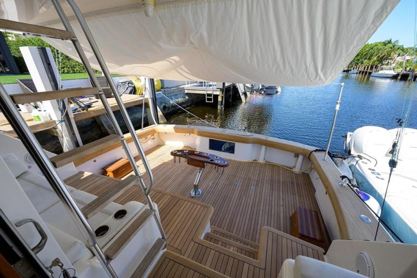 a boat on the water aboard ENCLOSED BRIDGE Yacht for Sale