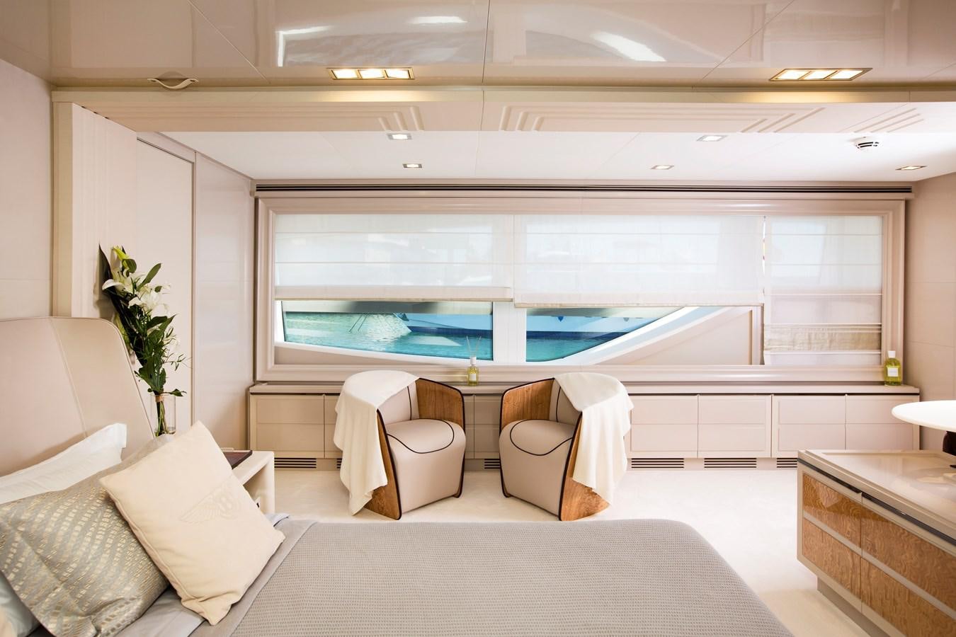 a room with a table and chairs aboard SONNY II Yacht for Sale
