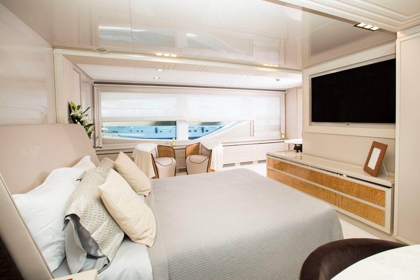 a room with a bed and a television aboard SONNY II Yacht for Sale