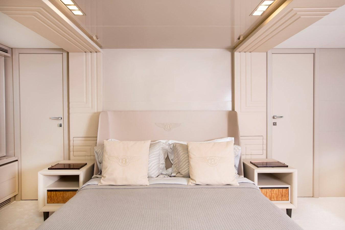 a bed with white sheets aboard SONNY II Yacht for Sale