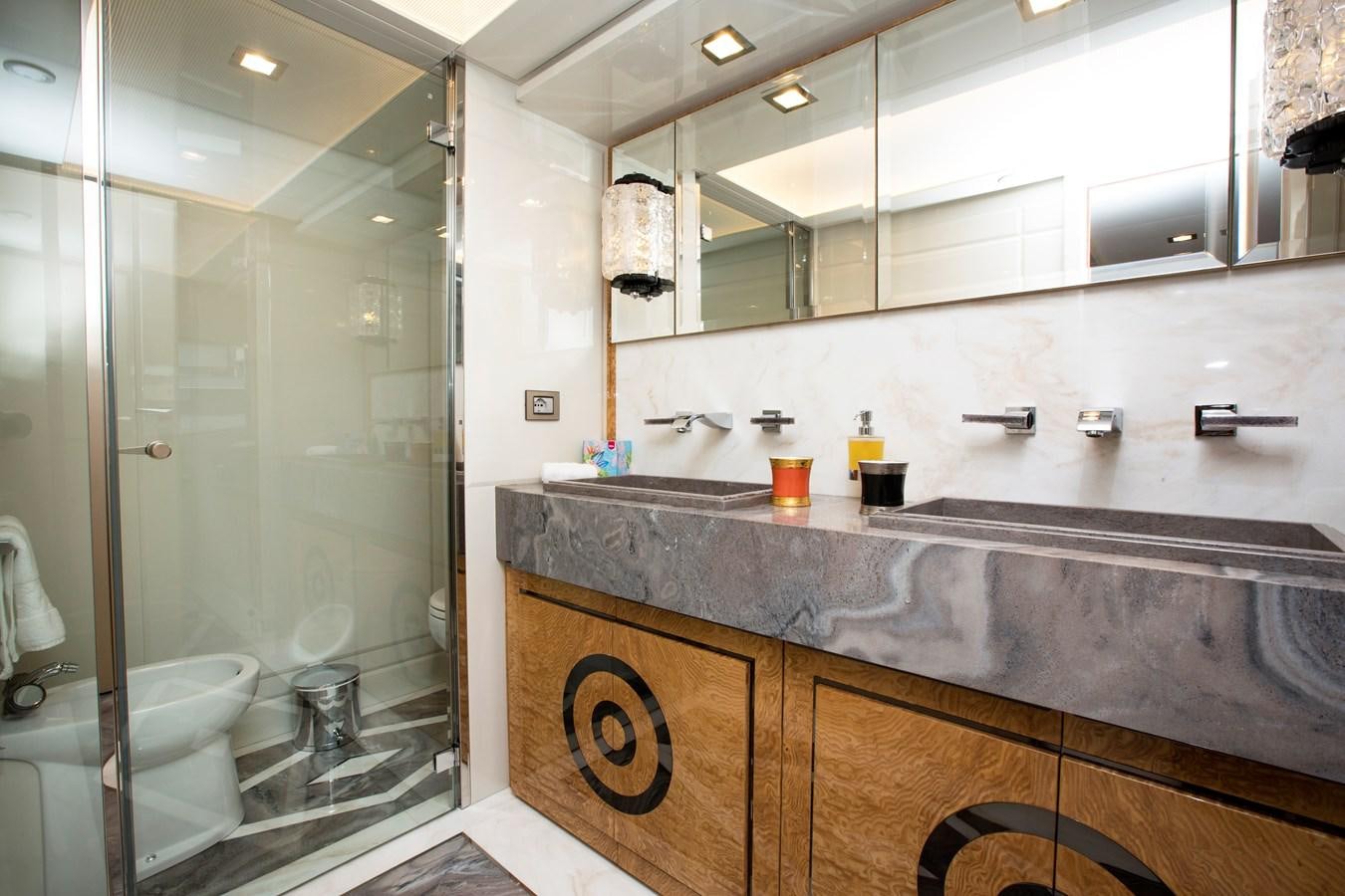a bathroom with a large mirror aboard SONNY II Yacht for Sale