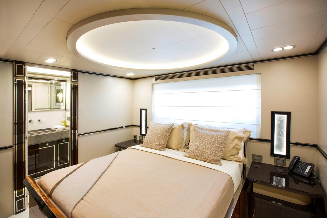 a hotel room with a bed aboard SONNY II Yacht for Sale