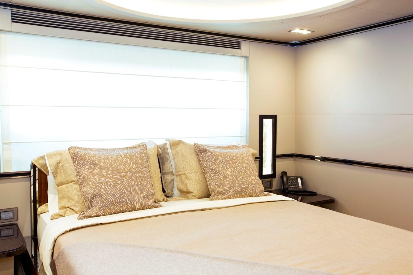 a bed with pillows aboard SONNY II Yacht for Sale