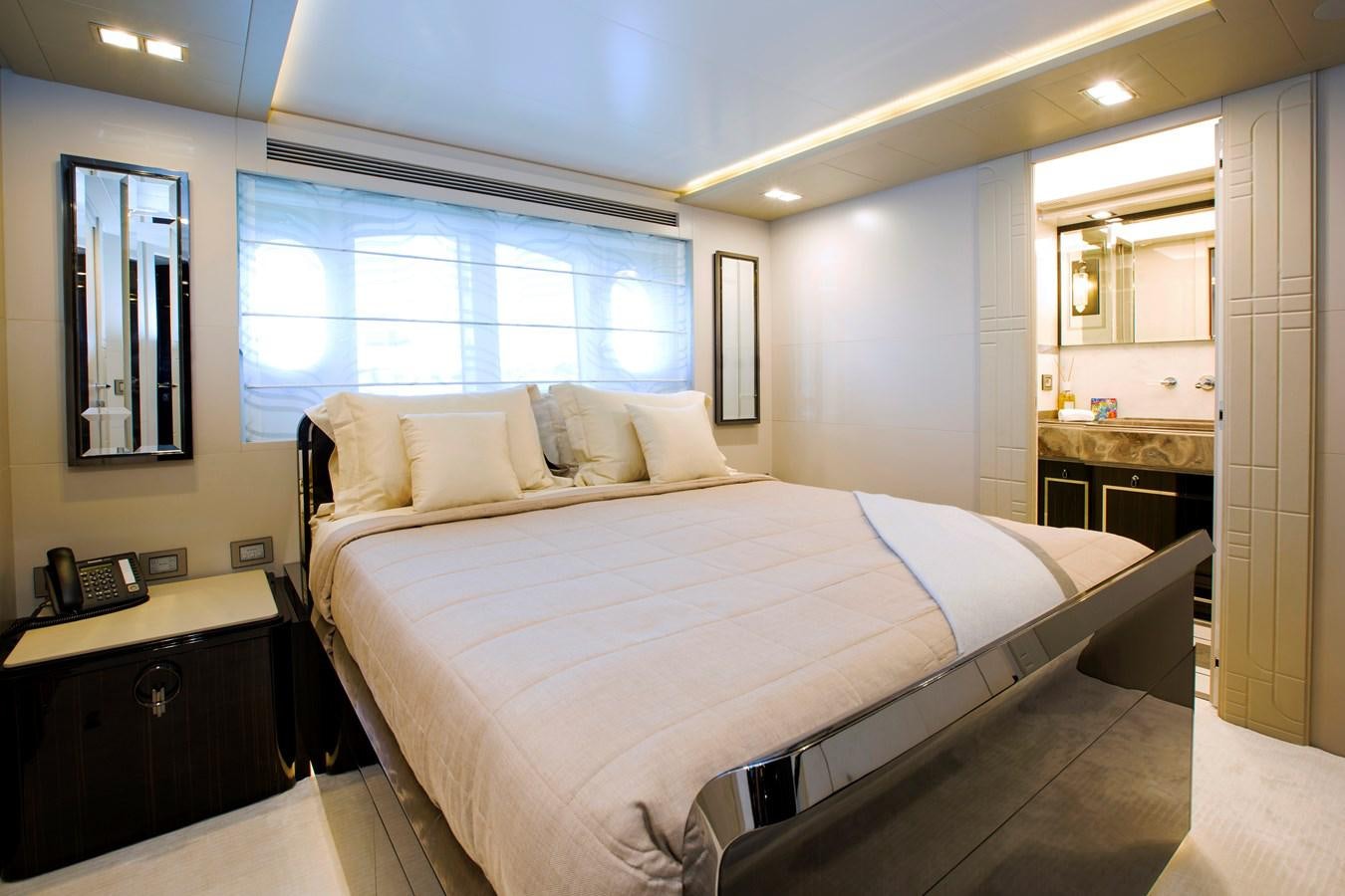 a bed in a hotel room aboard SONNY II Yacht for Sale
