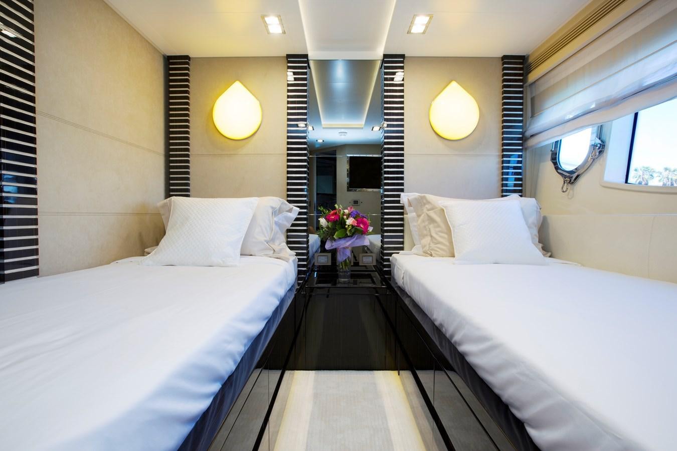 a couple of beds in a hotel room aboard SONNY II Yacht for Sale