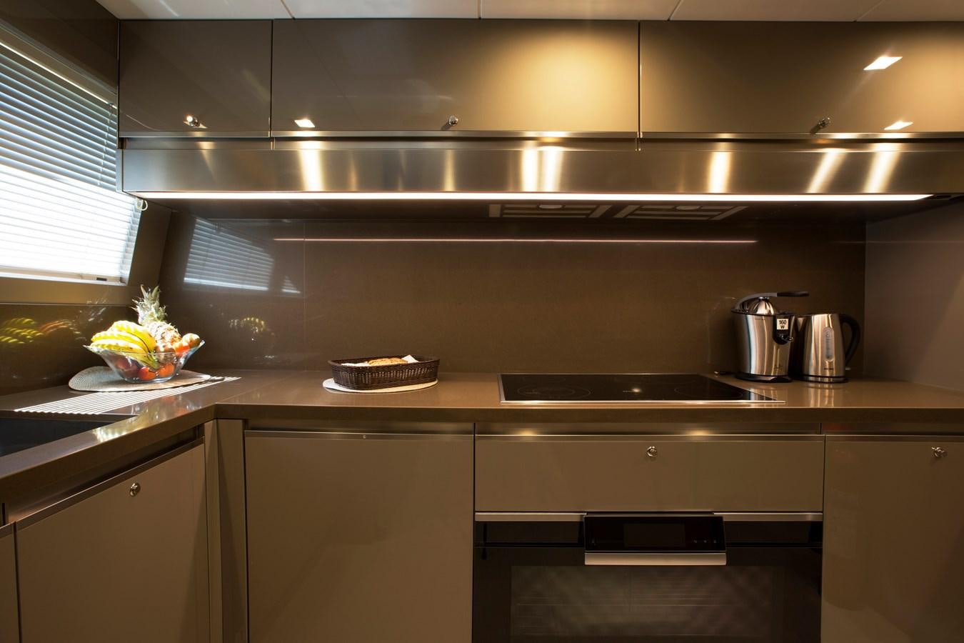 a kitchen with a stainless steel sink aboard SONNY II Yacht for Sale
