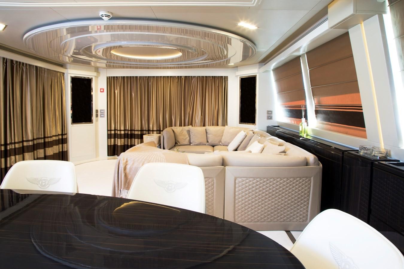 a room with a bed and a table aboard SONNY II Yacht for Sale