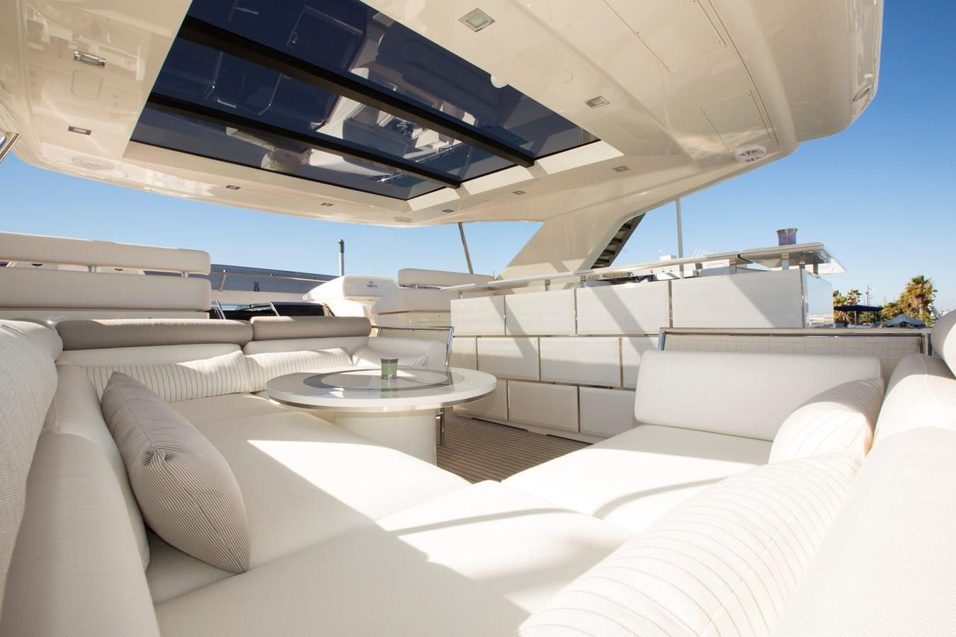 a room with a table and chairs aboard SONNY II Yacht for Sale