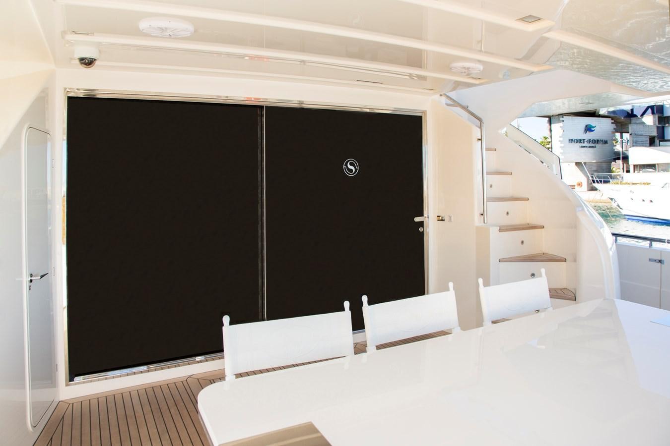 a room with a black screen aboard SONNY II Yacht for Sale