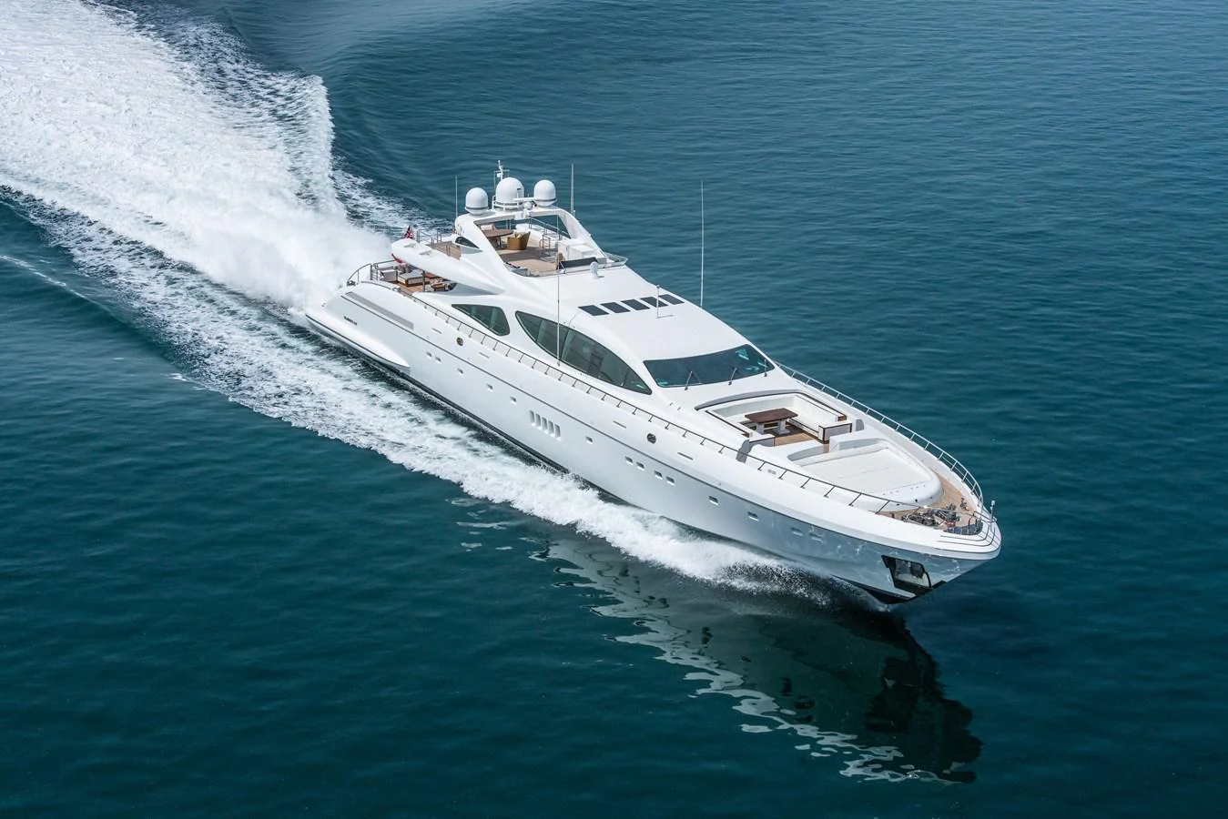 a white yacht on the water aboard SAMHAN Yacht for Sale