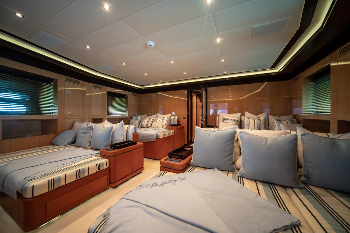 a room with a bed and a large window aboard SAMHAN Yacht for Sale