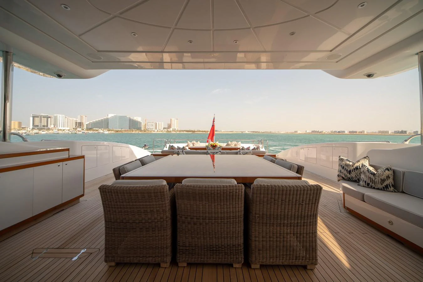 a room with a table and chairs aboard SAMHAN Yacht for Sale