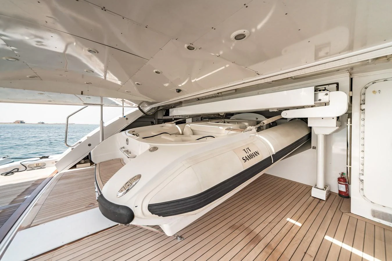 a boat on a deck aboard SAMHAN Yacht for Sale