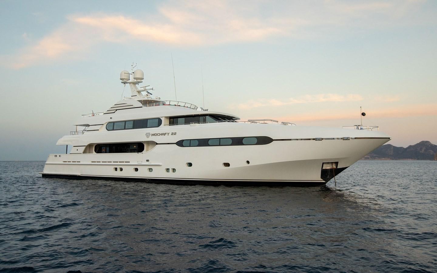 a white yacht in the water aboard MAXIMILIAN MMIV Yacht for Charter