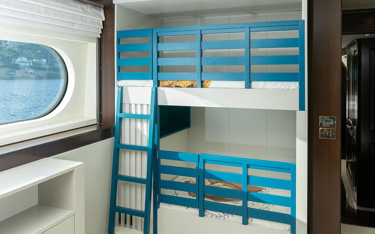a blue and white striped staircase aboard MAXIMILIAN MMIV Yacht for Charter