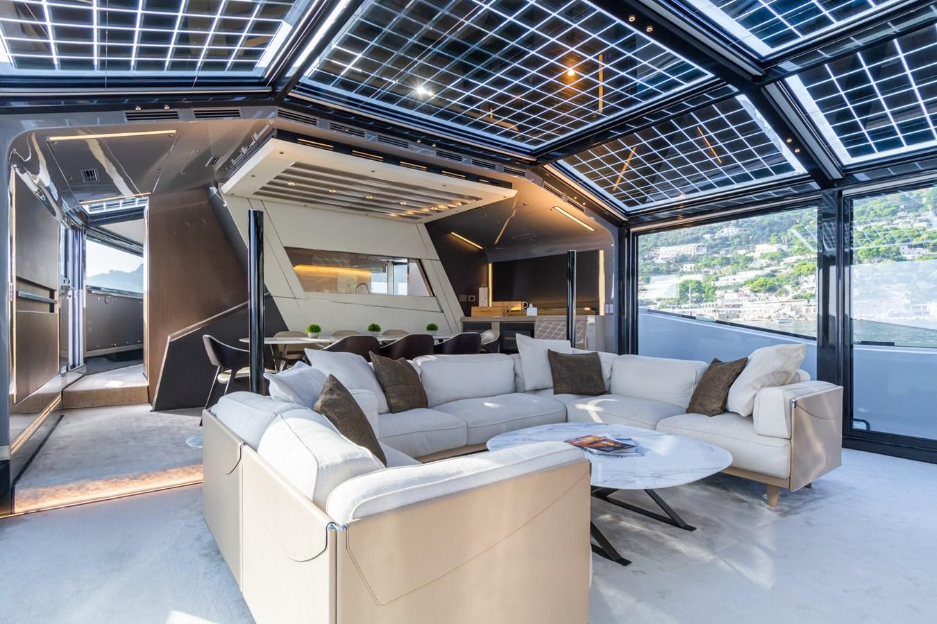 a living room with a large window aboard MILU' Yacht for Sale