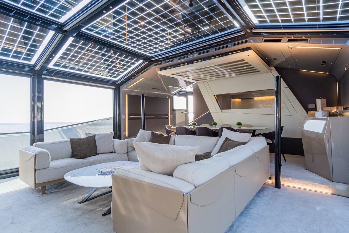 a living room with a large window aboard MILU' Yacht for Sale