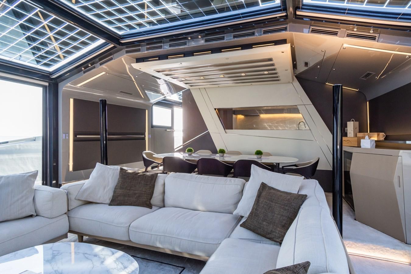 a room with a couch and a table aboard MILU' Yacht for Sale
