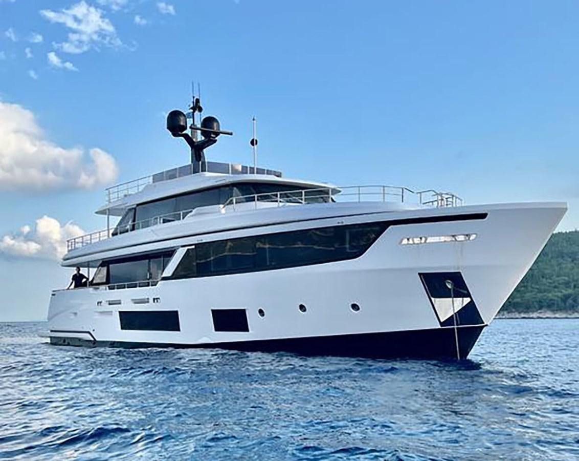 a white boat on water aboard CHECKMATE Yacht for Sale