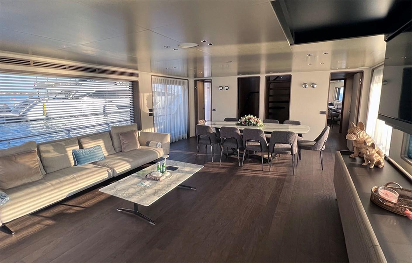 a living room with a large window aboard CHECKMATE Yacht for Sale