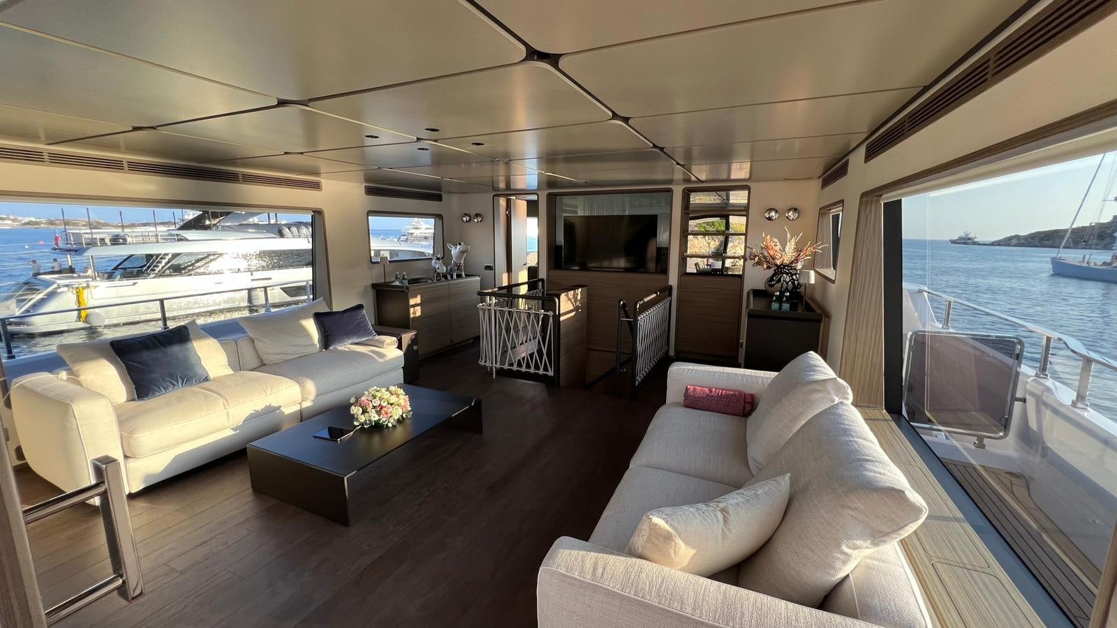 a living room with a large window aboard CHECKMATE Yacht for Sale
