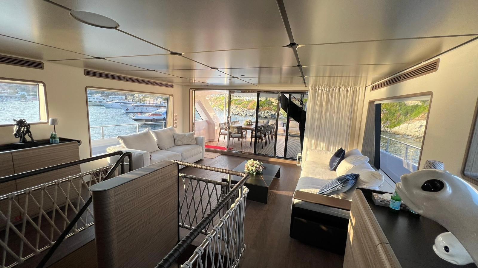 a living room with a large window aboard CHECKMATE Yacht for Sale