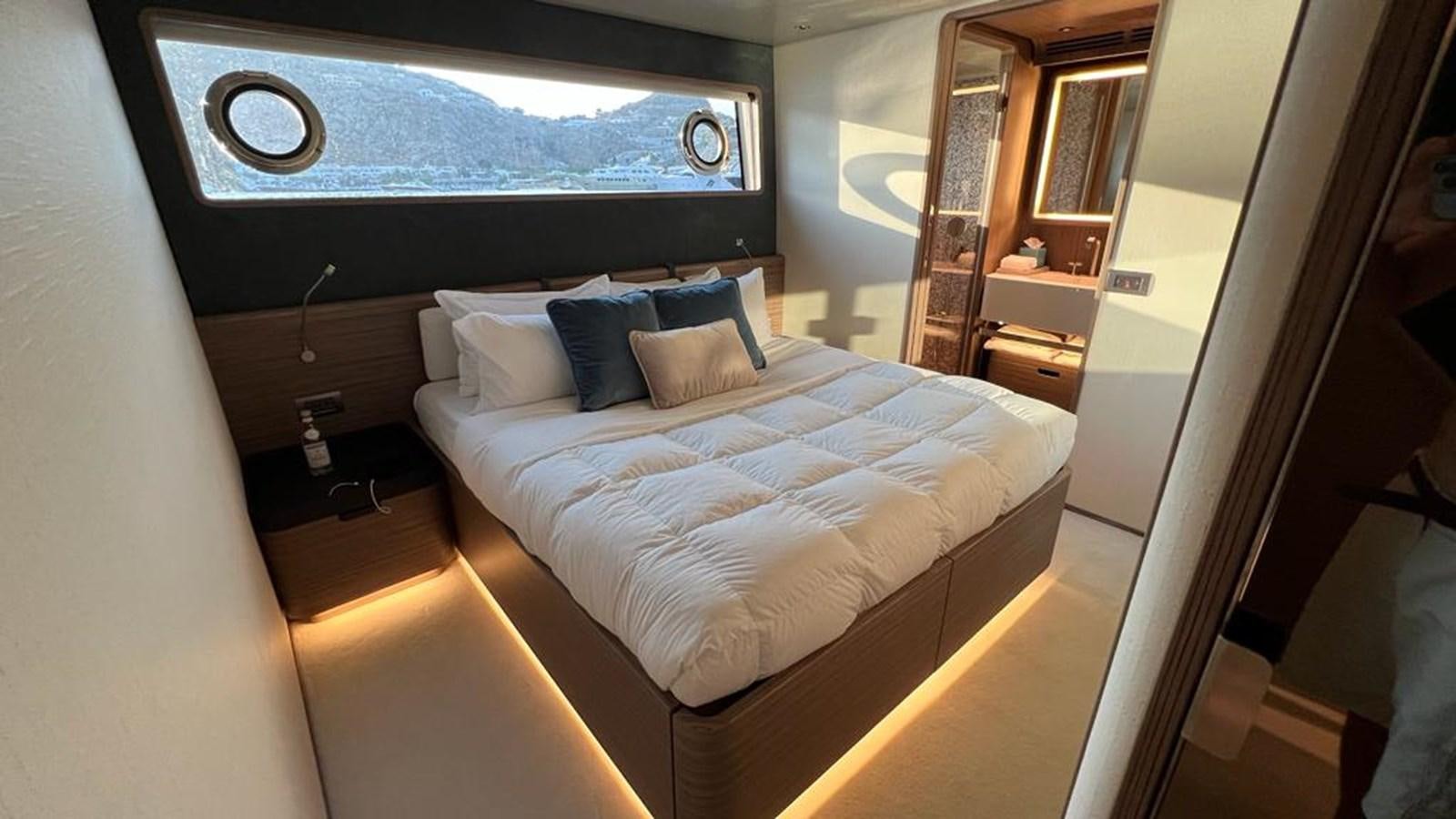 a bed in a room aboard CHECKMATE Yacht for Sale