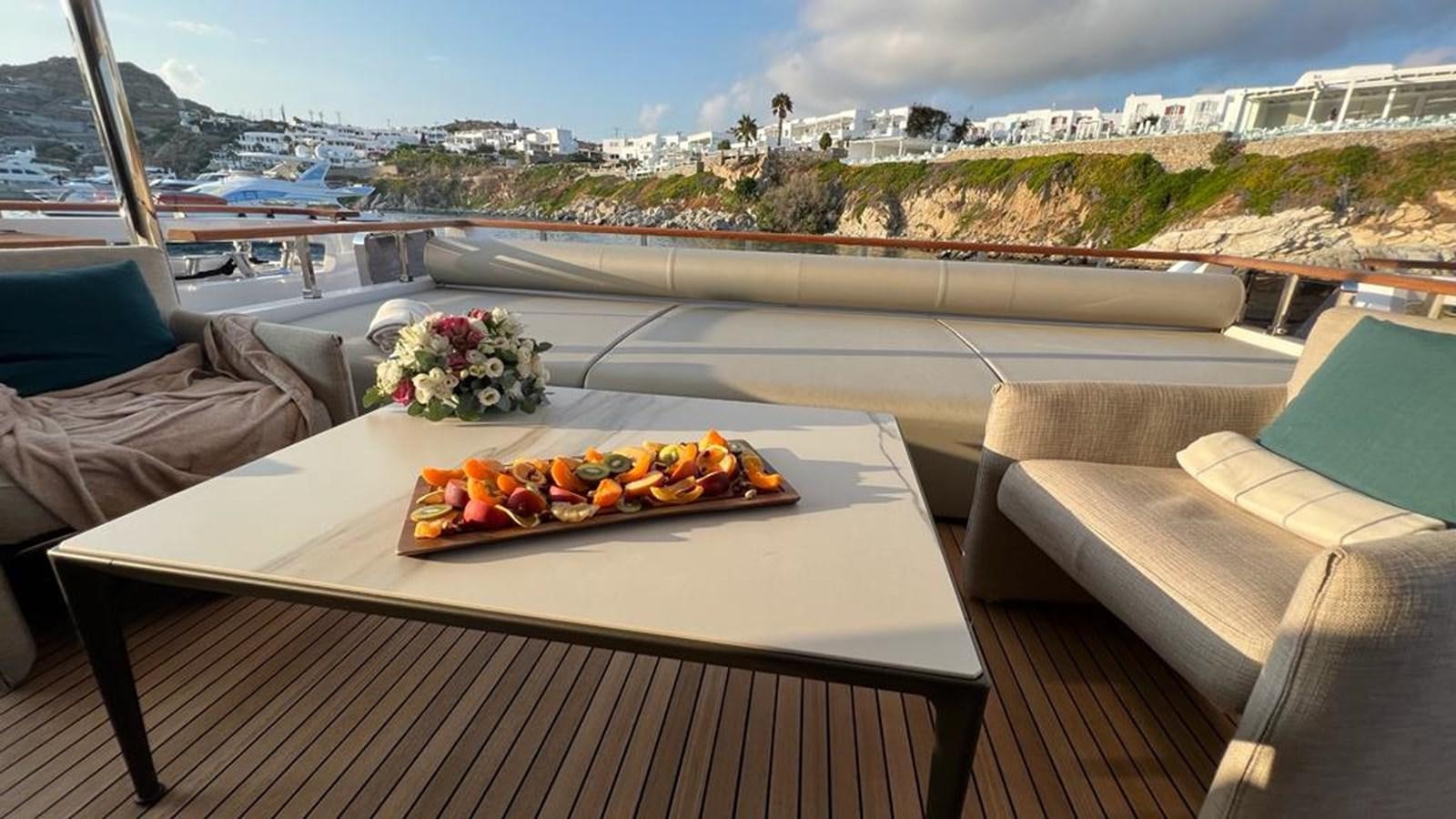 a table with food on it aboard CHECKMATE Yacht for Sale