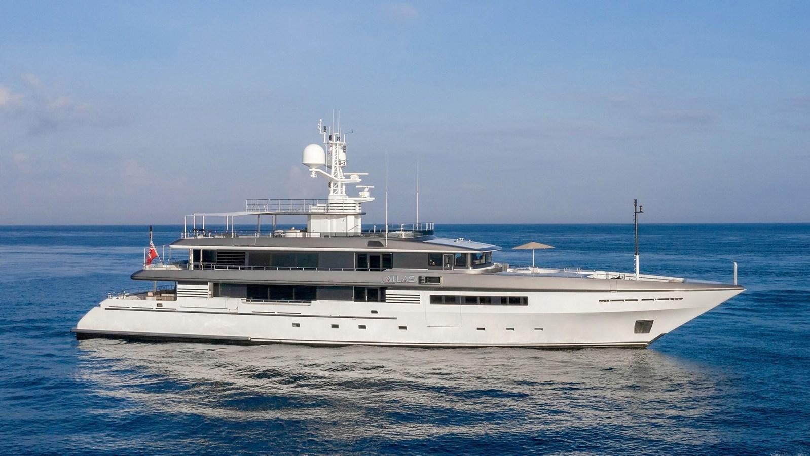 a large white boat in the water aboard ATLAS Yacht for Sale
